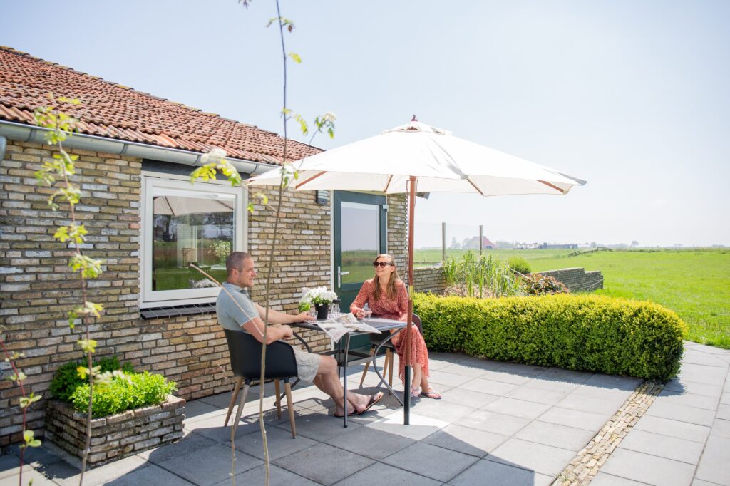 Terras Under de Wol met weilandzicht